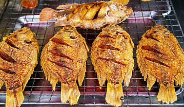 Grilled fish cooking in asian spicy