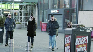 New York City, USA - April 14, 2020 People in medical masks on the streets of New York. People walk in Times Square in