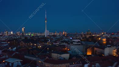 AERIAL: Day to Night Drone Hyper Lapse, Motion Time Lapse over Berlin with Alexanderplatz TV Tower view and beautiful
