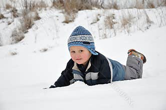 Child having fun on snow