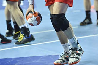 Handball player`s hand with the ball
