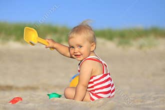 Baby girl on a beach