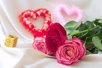Two hearts and roses