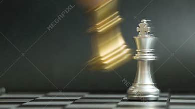 Gold king chess piece knock and win over silver team on black background Concept for company strategy, business victory
