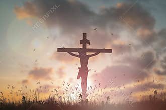Silhouette Jesus christÂ deathÂ on cross crucifixion on calvary hill in sunset good friday risen in easter day concept for