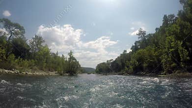 Rafting on a mountain river by boat. First-person shooting