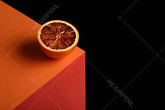 Abstract image of red orange on illusionary cube on black background