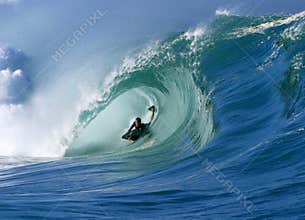 Surfing a Perfect Tube Wave at Waimea Bay Hawaii