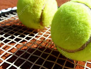 tennis balls and racket