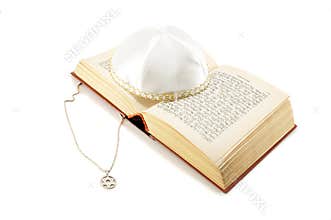 Jewish holiday still life with torah and kippah