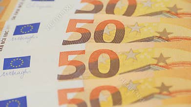 closeup 50 euro banknotes of european union, concept of savings, banking, tax payment, economic cooperation, actual