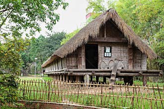 Replica of a traditional tribal house at the Vietnam Museum of Ethnology in Hanoi