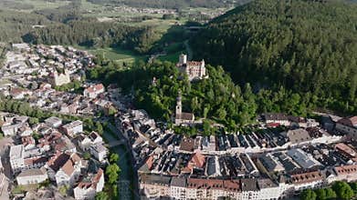 Aerial Drone shot of Brunico or Bruneck, a small town in South Tyrol. Evening time in Italian Alps Alto Adige