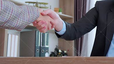 Young asian businesswoman job interview with caucasian manager and agreement with handshake at office.
