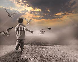 Child running through fog to light of new day.