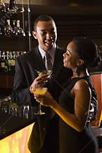 Couple at bar.