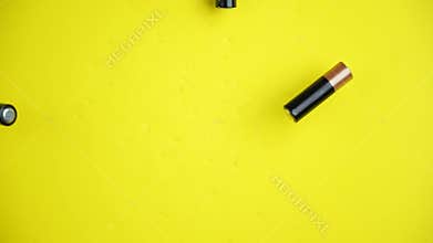 Batteries fall on the yellow floor