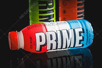 Prime Energy Drink . Bottle drink on black table