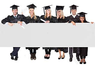 Group of graduate students presenting empty banner