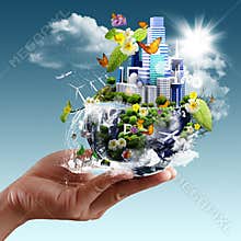 Hand holding the half earth