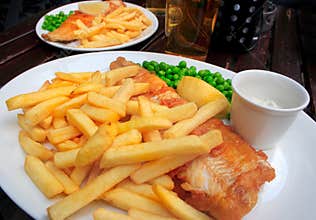 Two plates with fish and chips