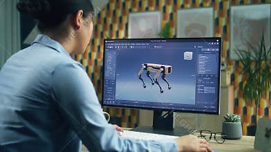Woman working on 3D model on pc at home