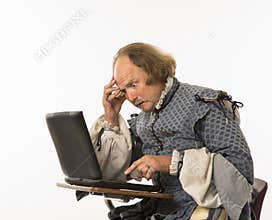Shakespeare using laptop.
