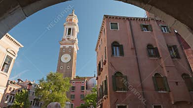 Gimbal shot of Venice, Italy. Steady POV of arch and old historic buildings in Venice. Gimbal high quality shot