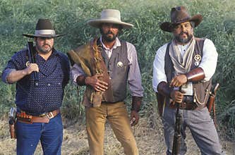 Cwboys during frontier reenactment