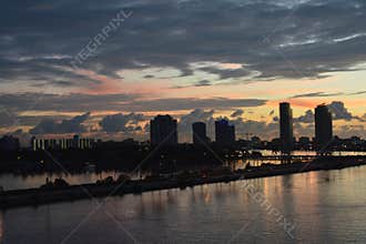 Sunrise Over Miami Skyline with Reflections on the Water