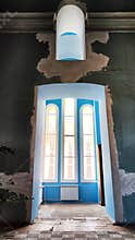 Castle window in a medieval style. Arched window on a facade of medieval wall. Ancient window, old architecture element