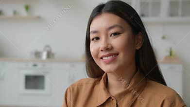 Portrait Asian korean ethnicity woman smiling toothy dental smile chinese girl businesswoman posing in domestic home