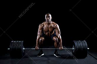 Strong man deadlifts a lot of weight