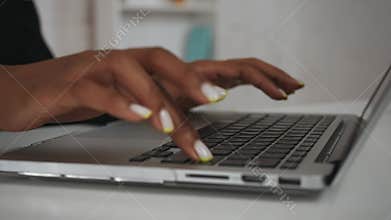 Modern businesswoman creative concept. Closeup shot of the woman at the desk, female hands typing something on laptop