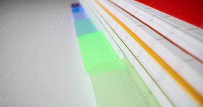 Multi-colored folders with protruding icons for records