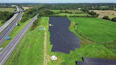 Aerial view on the A7 motorway in northern Germany between fields and meadows