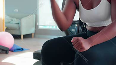 Closeup hands young black woman training exercise or workout with lifting dumbbell for bodybuilder with strong in fitness.