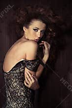 Mysterious pose of an attractive lady