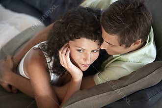 Affectionate Couple On Couch