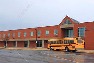 School Building with Bus