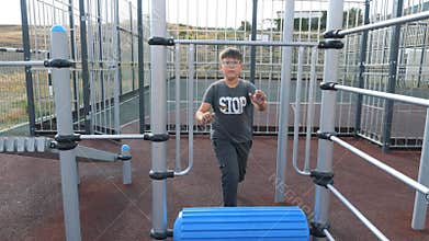 Children on the playground on the street in the yard. Live a healthy life. Be H3althy