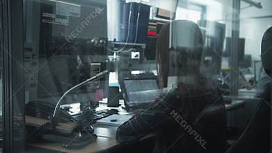 Navigation control room in the airport - a woman working with a monitor with air traffic