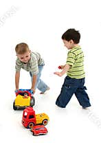 Boys Playing with Cars and Trucks