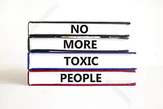 No more toxic people symbol. Concept words No more toxic people on books on a beautiful white table white background. Business,