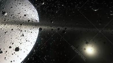 Cinematic animation of Saturn's rings made of rocks, dust and ice. Planet Saturn is a huge planet of the solar
