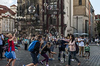The attraction of soap bubbles.