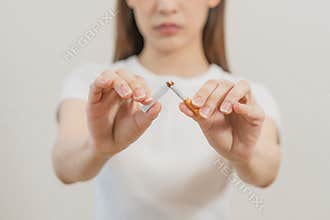 Quit, stop smoking, addiction asian young woman, girl refusing cigarette, smoker quitting smoke, hand in broken, break tobacco.