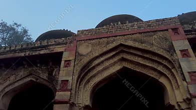 Cinematic view of three domed mosque and shisha gumbad, Lodhi Garden, Delhi