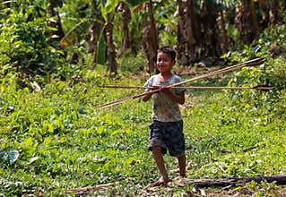 Young Machiguenga boy with arrows