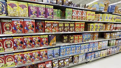 Walmart grocery store interior cereal aisle pan